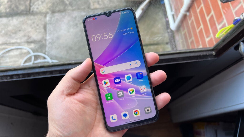 Oppo A78 5G in-hand with display on