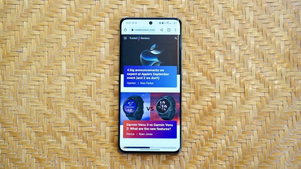 Oppo Reno 10 5G displaying the Trusted Reviews website