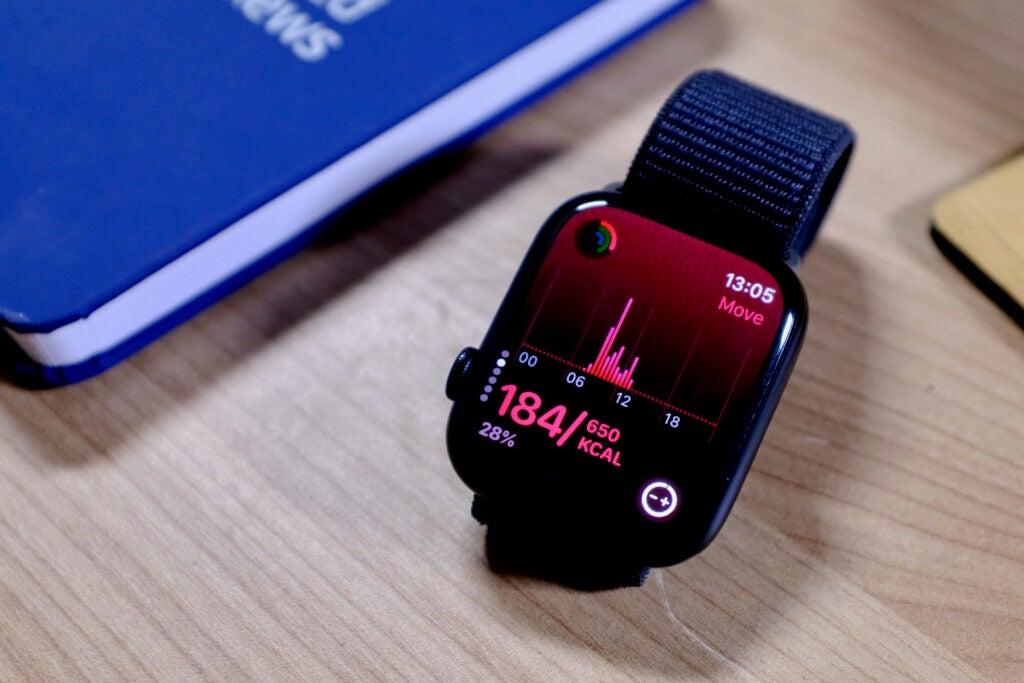 Apple Watch Series 9 on table showing activity date