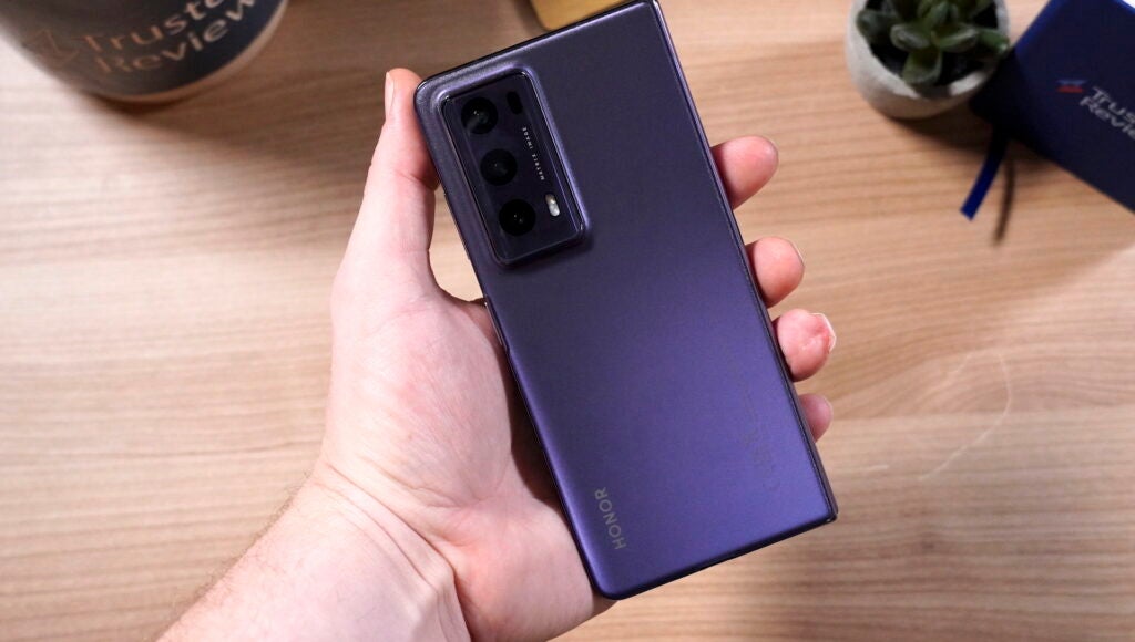 Honor Magic V2 in-hand, showing the rear