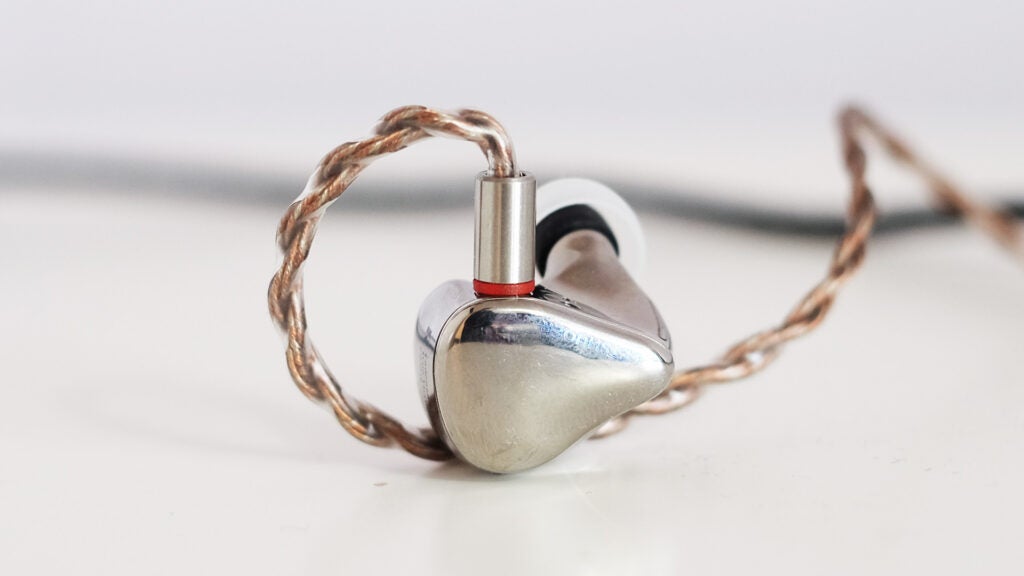 Close-up of Letshuoer Cadenza earphone and braided cable.