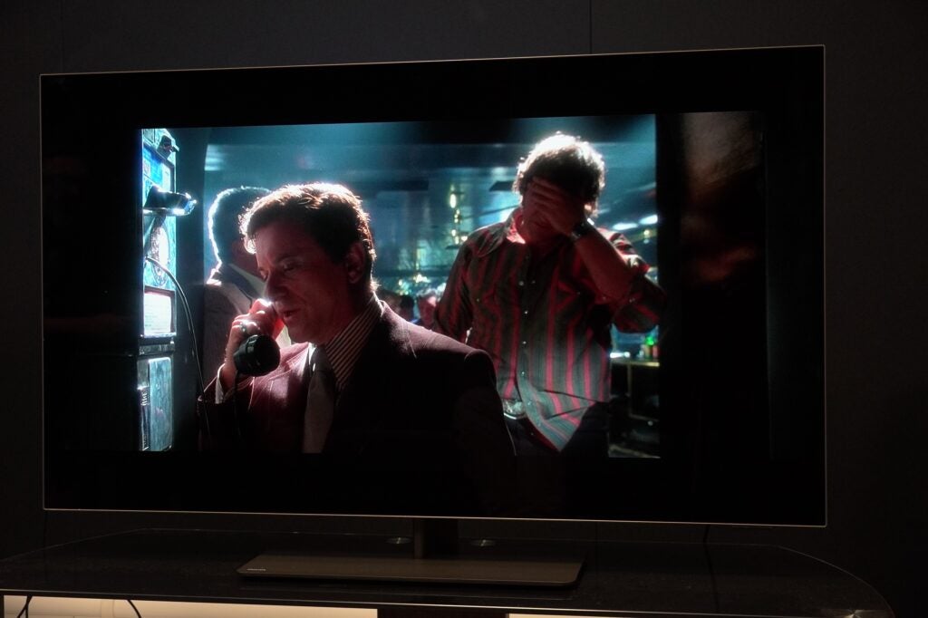 Philips 48OLED808 CasinoPhilips OLED TV displaying high-contrast movie scene.