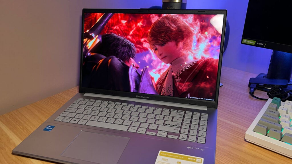 The Asus Vivobook Go 15 showing a screenshot of Final Fantasy XVI on its OLED display.
