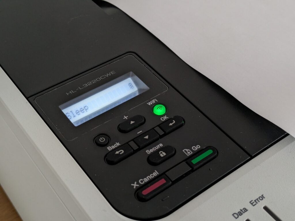 This printer's control panel. The display is illuminated and displays 'sleep'