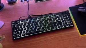 The Corsair K55 Core keyboard on a desk.