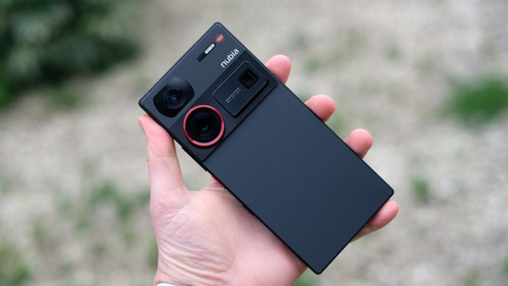 Nubia Z60 Ultra rear viewHand holding Nubia Z60 Ultra smartphone with rear cameras visible