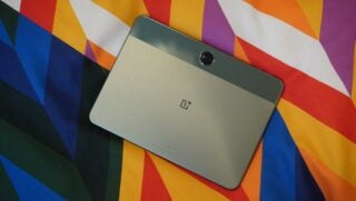 OnePlus Pad Go on a colourful pillow
