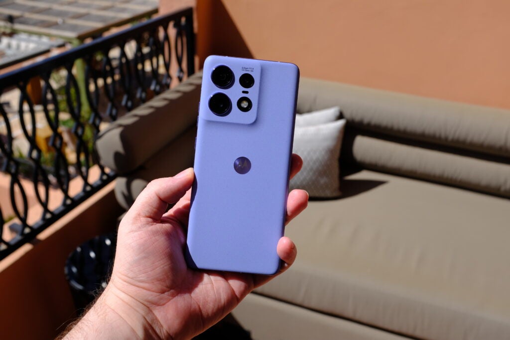 Moto Edge 50 Pro in Lavender leather being held