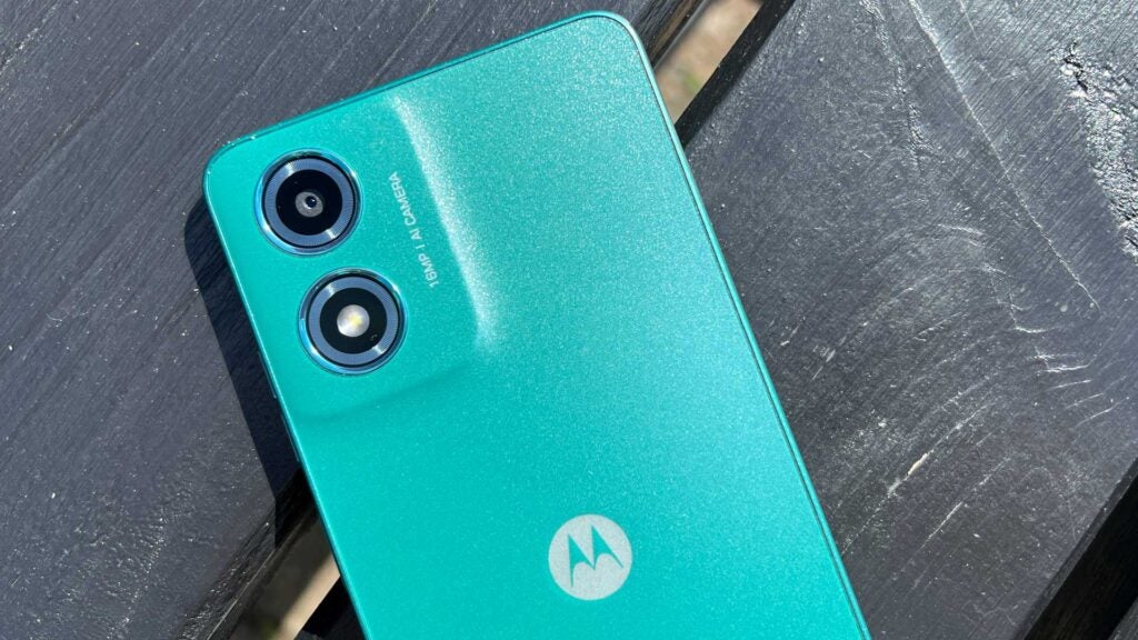 A rear view of the Moto G04 in direct sunlight.